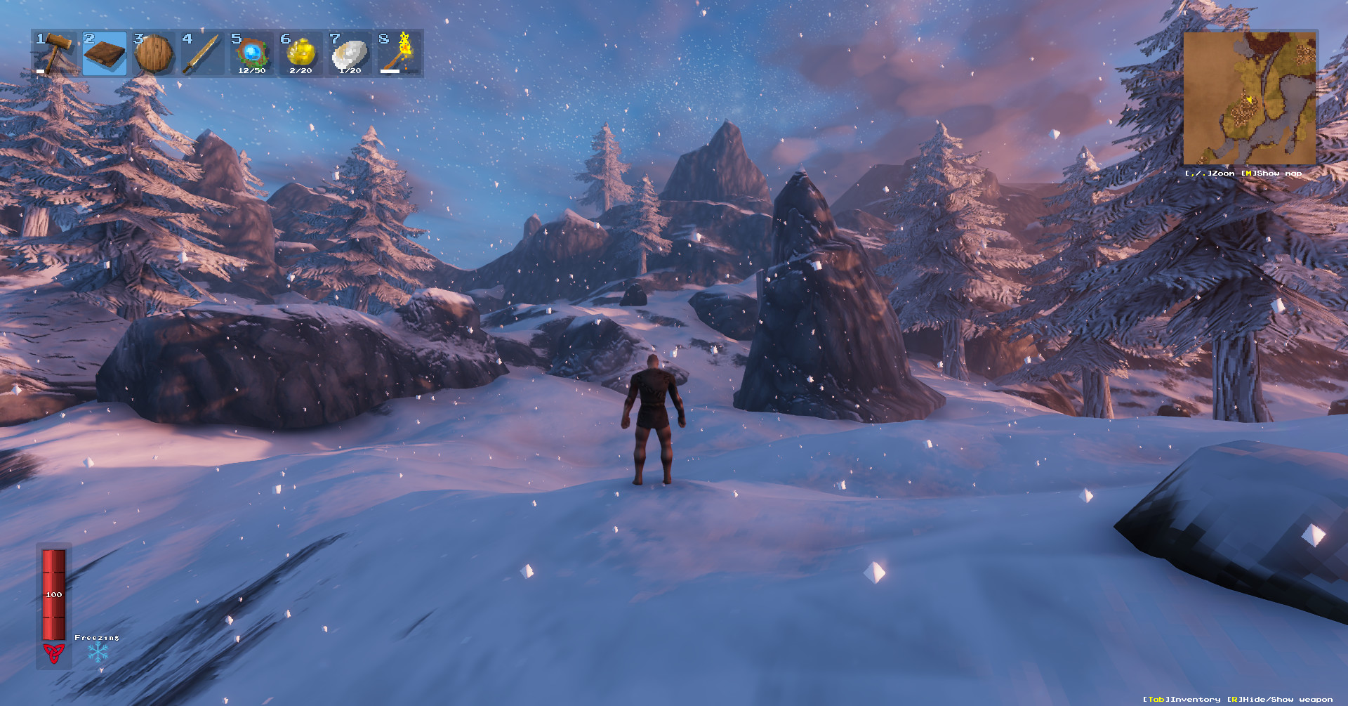 A Viking warrior standing in the snowy Mountains biome of Valheim.